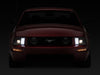 Raxiom 05-09 Ford Mustang w/ Halogen Prjctor Headlights- Black Housing (Clear Lens) (No GT500 ) Raxiom