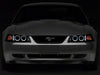 Raxiom 99-04 Ford Mustang Dual LED Halo Projector Headlights- Black Housing (Smoked Lens) Raxiom